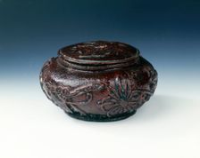 Lacquered and moulded mandarin orange skin box, Qing dynasty, China, 19th century