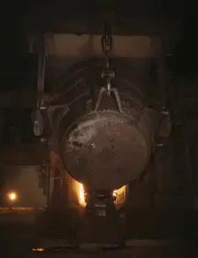 Ladle of molten iron is poured into..., Allegheny Ludlum Steele Corp., Brackenridge, Pa., (1941?). Creator: Alfred T Palmer