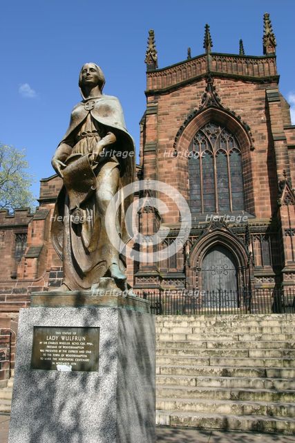 Lady Wulfrun statue and St Peter's Church, Wolverhampton, West Midlands. Creator: Peter Thompson.