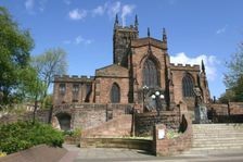 Lady Wulfrun statue and St Peter's Church, Wolverhampton, West Midlands. Creator: Peter Thompson