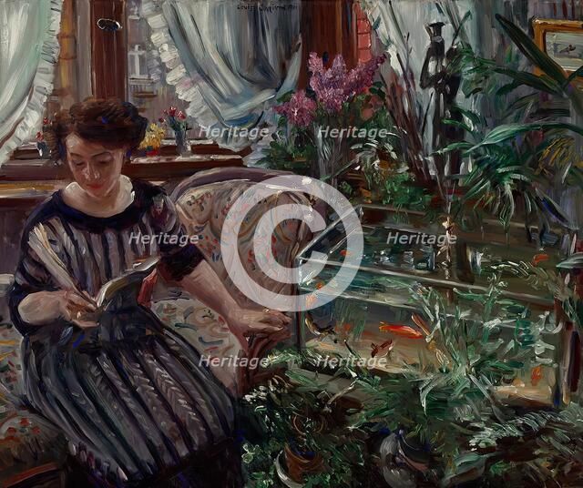 Lady at the goldfish tank, 1911. Creator: Lovis Corinth.