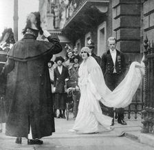 Lady Elizabeth Bowes-Lyon on her way to be married at Westminster Abbey, 26 April 1923, (1937). Creator: Unknown