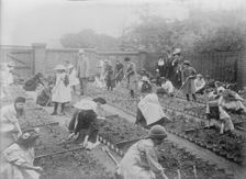 Lady Henry showing T.P. O'Connor over Children's Garden, 1913. Creator: Bain News Service