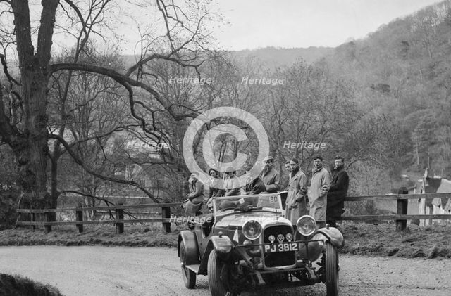 Lagonda 4-seat tourer of CE Littler competing in the RAC Rally, 1939. Artist: Bill Brunell.