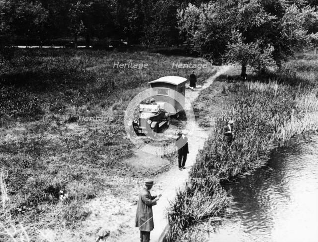 Lagonda towing a caravan, (1924?). Artist: Unknown