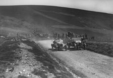 Lagonda of WH Oates and DFP of JC Douglas competing in the Scottish Light Car Trial, 1922. Artist: Bill Brunell