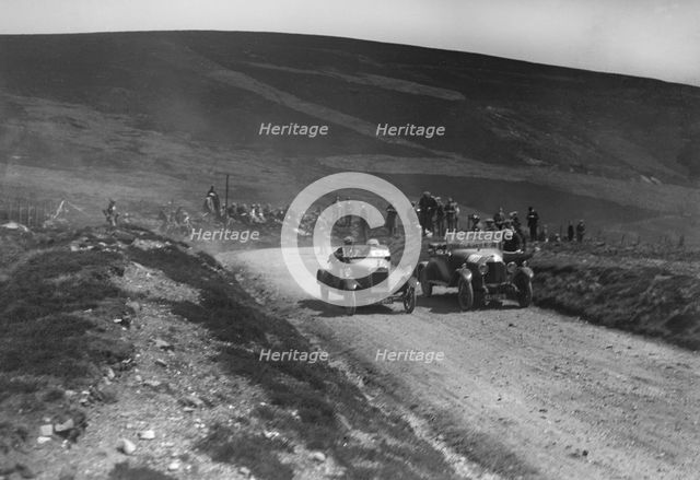 Lagonda of WH Oates and DFP of JC Douglas competing in the Scottish Light Car Trial, 1922. Artist: Bill Brunell.