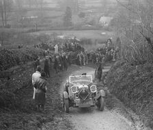 Lagonda of WM Couper performing a braking test, MCC Exeter Trial, Ibberton Hill, Dorset, 1930. Artist: Bill Brunell