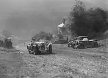 Lagonda of Lord de Clifford passing two MG M types during the MCC Sporting Trial, 1930. Artist: Bill Brunell