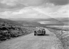 Lagonda open tourer of CG Seddon competing in the RSAC Scottish Rally, 1934. Artist: Bill Brunell