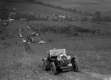 Lagonda Rapier competing in the London Motor Club Coventry Cup Trial, Knatts Hill, Kent, 1938. Artist: Bill Brunell