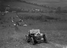 Lagonda Rapier competing in the London Motor Club Coventry Cup Trial, Knatts Hill, Kent, 1938. Artist: Bill Brunell