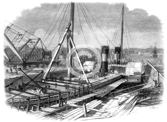 Laird's Graving Docks at Birkenhead: the Hibernia under repair, 1861. Creator: Unknown.