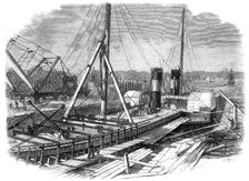 Laird's Graving Docks at Birkenhead: the Hibernia under repair, 1861. Creator: Unknown