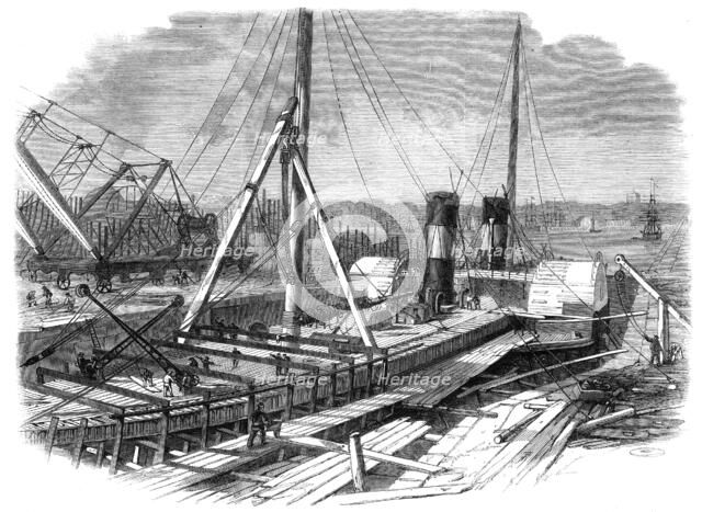 Laird's Graving Docks at Birkenhead: the Hibernia under repair, 1861. Creator: Unknown.