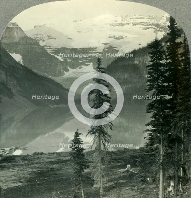 'Lake Louise, the "Queen of Lakes", and Mount Victoria. Alberta, Canada.', c1930s. Creator: Unknown.