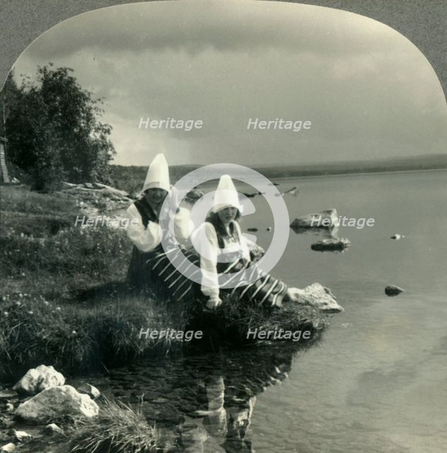 'Lake Siljan Mirrors the Past in the Life of the Present. Rattvik Costumes in Dalecarlia, Sweden', c Creator: Unknown.