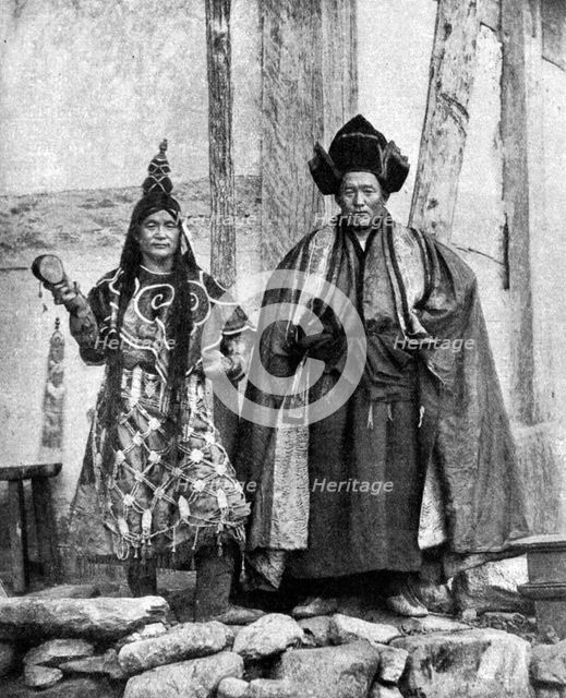Lamist priests of Sikkim wearing robes, Talung monastery, India, 1922.Artist: John Claude White