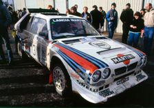 Lancia Delta S4, Markku Alen at Parc Ferme 1986 R.A.C. Rally. Creator: Unknown