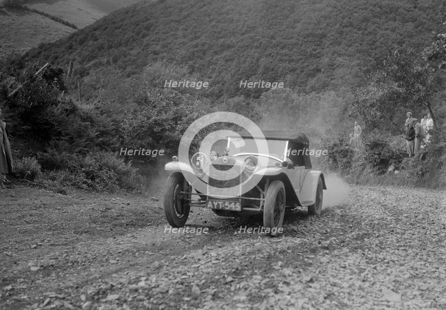 Lancia Lambda competing in the Mid Surrey AC Barnstaple Trial, Beggars Roost, Devon, 1934. Artist: Bill Brunell.