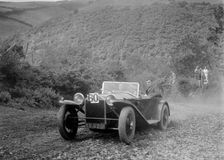 Lancia Lambda open tourer at the Mid Surrey AC Barnstaple Trial, Beggars Roost, Devon, 1934. Artist: Bill Brunell