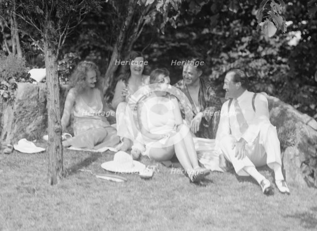 Langeloth group on Langeloth estate, Riverside, Connecticut, seated outdoors, 1932 June 7. Creator: Arnold Genthe.