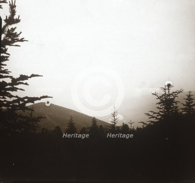 Landscape, smoke in distance, Alsace, c1914-c1918. Artist: Unknown.