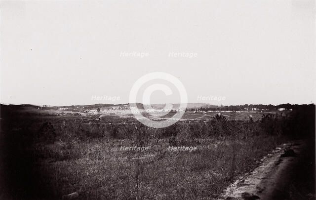 [Landscape with army encampment in the distance]. Brady album, p. 125, 1861-65. Creator: Unknown.