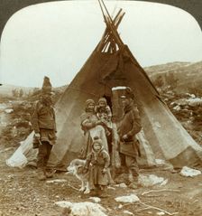 Laplander family and sledge dog - outside their summer home - on a hillside in Norway c1905. Creator: Unknown