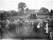 Large crowd gathered round a pen during the auction of rams, East Ilsley, West Berkshire, 1860-1922. Creator: Henry Taunt