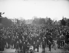 Large crowd on the bridge on May Morning to hear the college choir, Magdalen Bridge, Oxford, 1895. Creator: Henry Taunt
