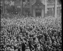 Large Crowd on the Streets of London Celebrating the Royal Wedding of the Duke of York and...1920. Creator: British Pathe Ltd
