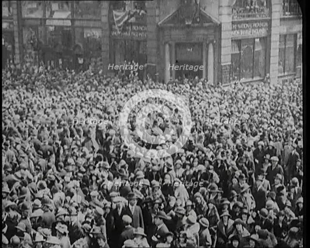 Large Crowd on the Streets of London Celebrating the Royal Wedding of the Duke of York and...1920. Creator: British Pathe Ltd.