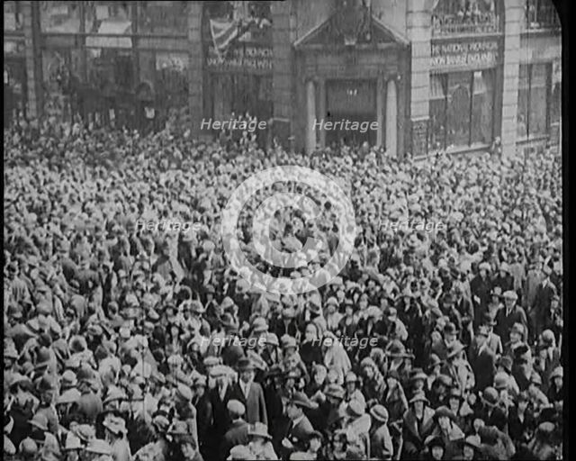 Large Crowd on the Streets of London Celebrating the Royal Wedding of the Duke of York and...1920. Creator: British Pathe Ltd.