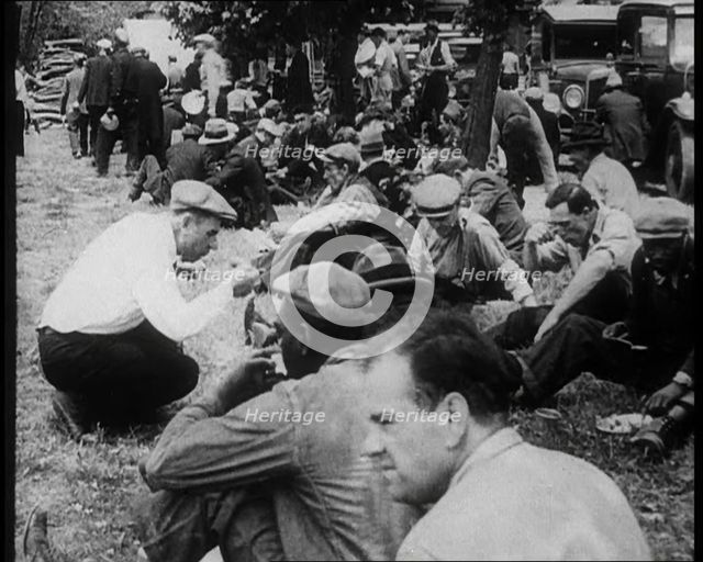 Large Crowd of American Civilians Eating Meals Outdoors, 1930. Creator: British Pathe Ltd.