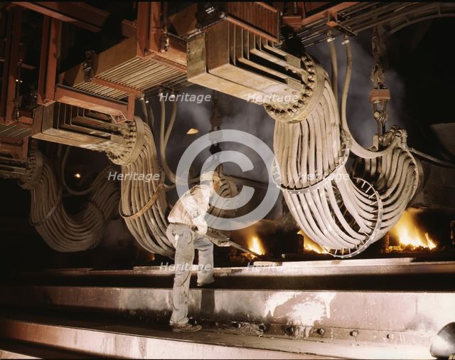 Large electric phosphate smelting furnace used in the making...Muscle Shoals area, Alabama, 1942. Creator: Alfred T Palmer.