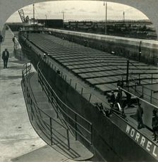 Large Iron Ore Boat Coming into Sabin Locks. Sault Ste. Marie, Mich. c1930s. Creator: Unknown