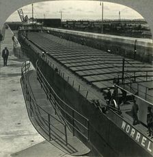 Large Iron Ore Boat Coming into Sabin Locks. Sault Ste. Marie, Mich. c1930s. Creator: Unknown