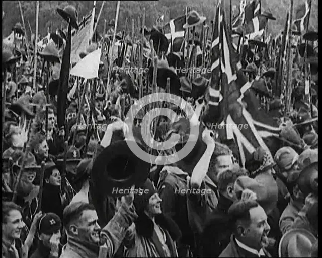 Large Numbers of Boy Scouts and Male Civilians Cheering at Jamboree, 1929. Creator: British Pathe Ltd.