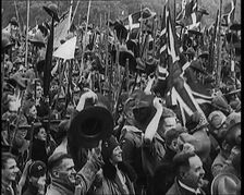 Large Numbers of Boy Scouts and Male Civilians Cheering at Jamboree, 1929. Creator: British Pathe Ltd