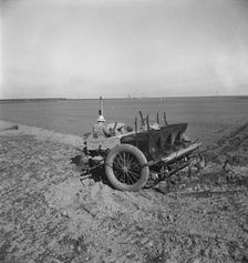 Large-scale, mechanized farming - potato planter, Kern County, California, 1939. Creator: Dorothea Lange