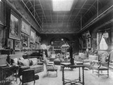 Large parlor of the William C. Whitney house, Washington, D.C., with many paintings on..., 1890s. Creator: Frances Benjamin Johnston