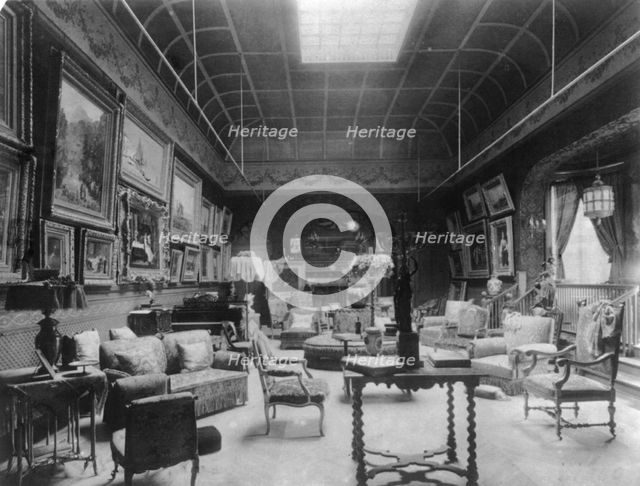 Large parlor of the William C. Whitney house, Washington, D.C., with many paintings on..., 1890s. Creator: Frances Benjamin Johnston.