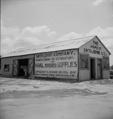 Large turpentine still and processing plant near Valdosta, Georgia, 1937. Creator: Dorothea Lange