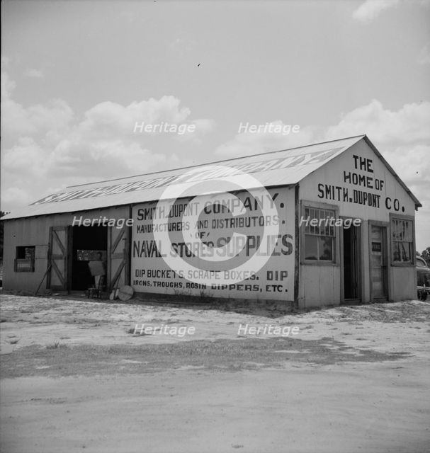 Large turpentine still and processing plant near Valdosta, Georgia, 1937. Creator: Dorothea Lange.