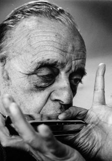 Larry Adler (1914-2001), Musician, playing his harmonica, 1992. Creator: Unknown