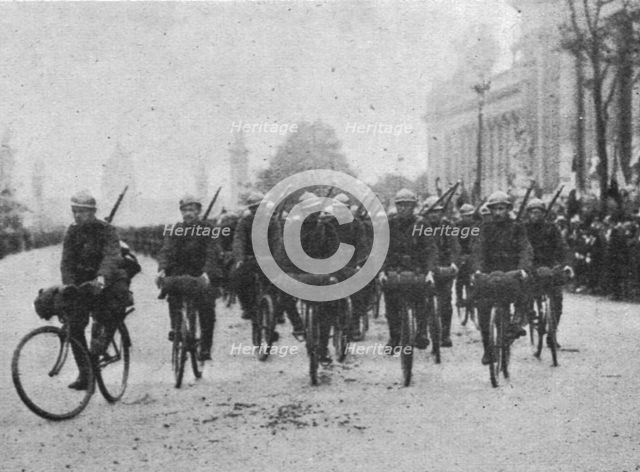 ''Le 14 juillet 1916 a Paris; les cyclistes belges', 1916. Creator: Unknown.