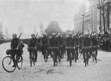 'Le 14 juillet 1916 a Paris; les cyclistes belges 1916. Creator: Unknown