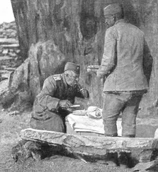Le commandant d'une des plus fameuses divisions serbes, dejeunant pres de son poste..., 1916. Creator: Vladimir Betzitch