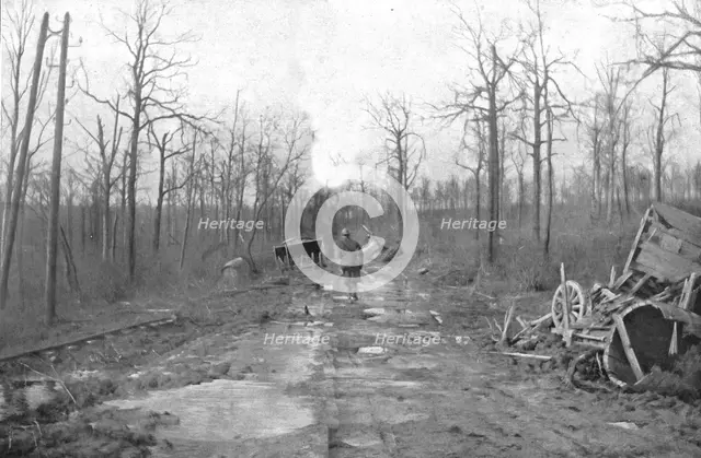 ''Le Champ de Bataille; La route "marmitee"', 1916 (1924) Creator: Unknown.